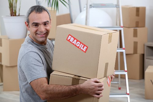 Boxes and furniture being loaded carefully for a Kennington house move