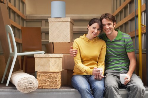 Local moving van handling boxes and household items in South London